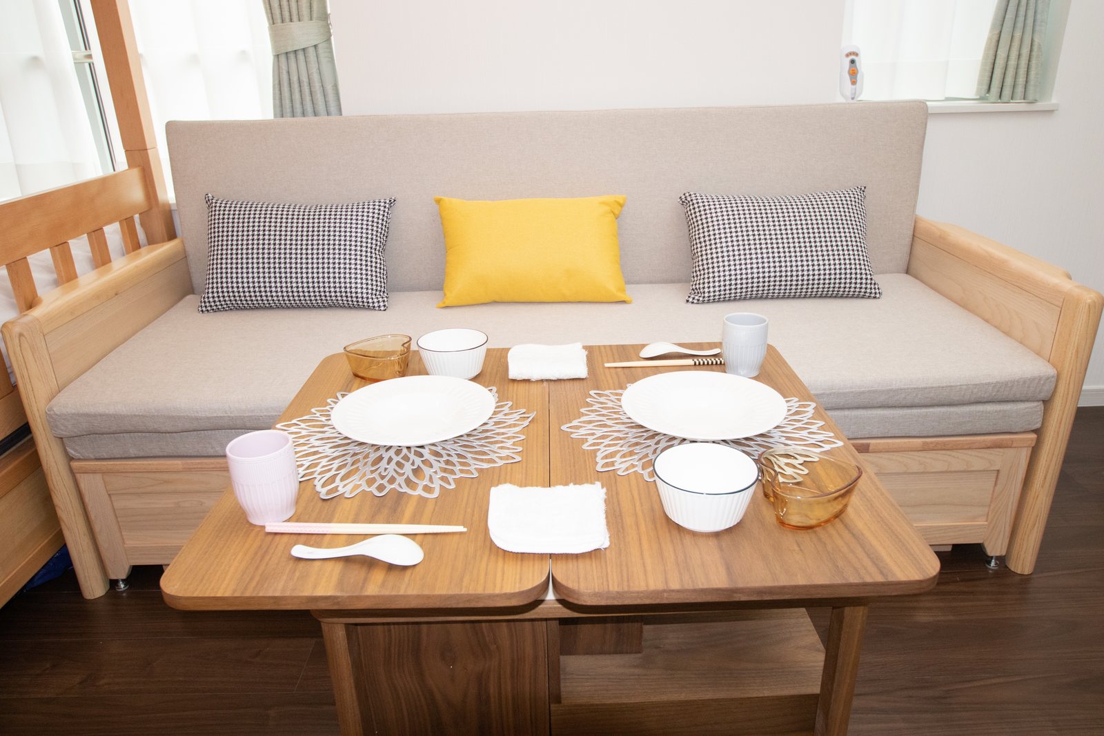 Room 201 bed, sofa, and table setting