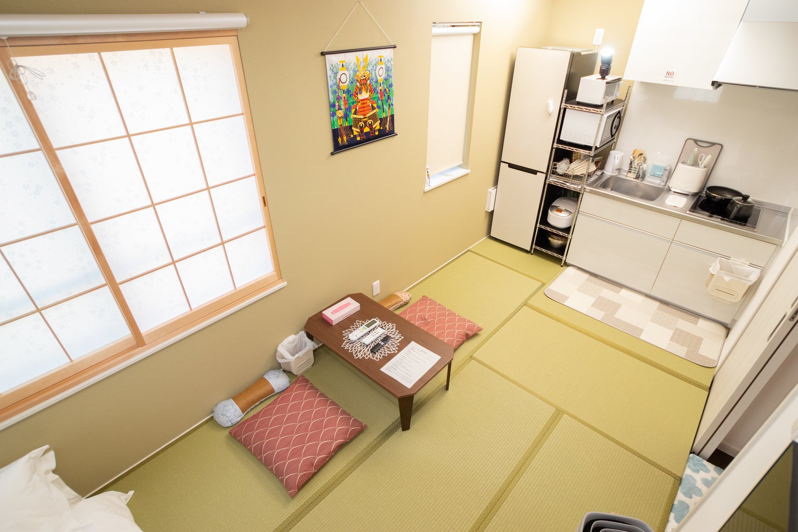 Room 401 tatami seating area and kitchenette